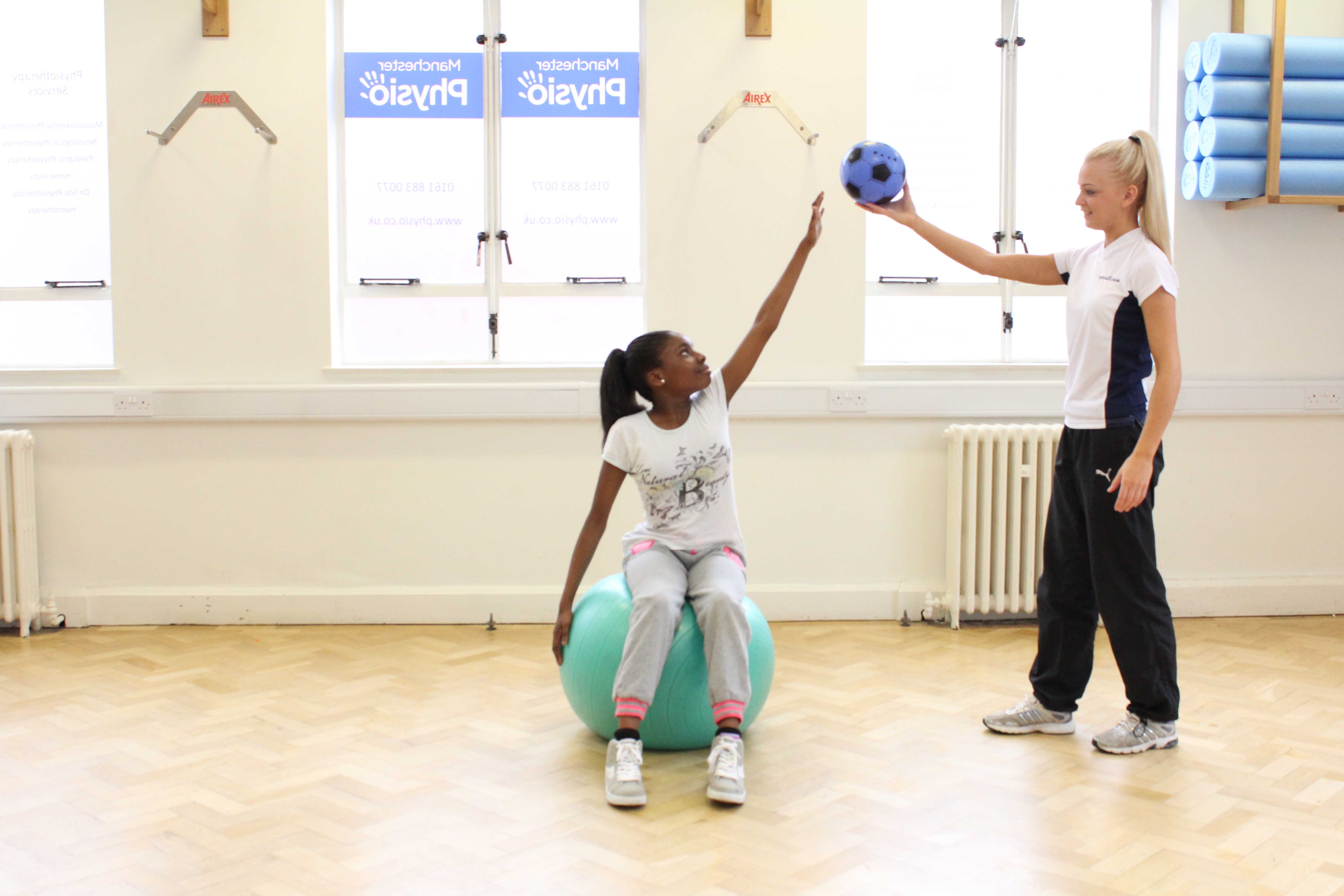 Rehabilitation through play, incorporating dynamic strength and stretching exercises.