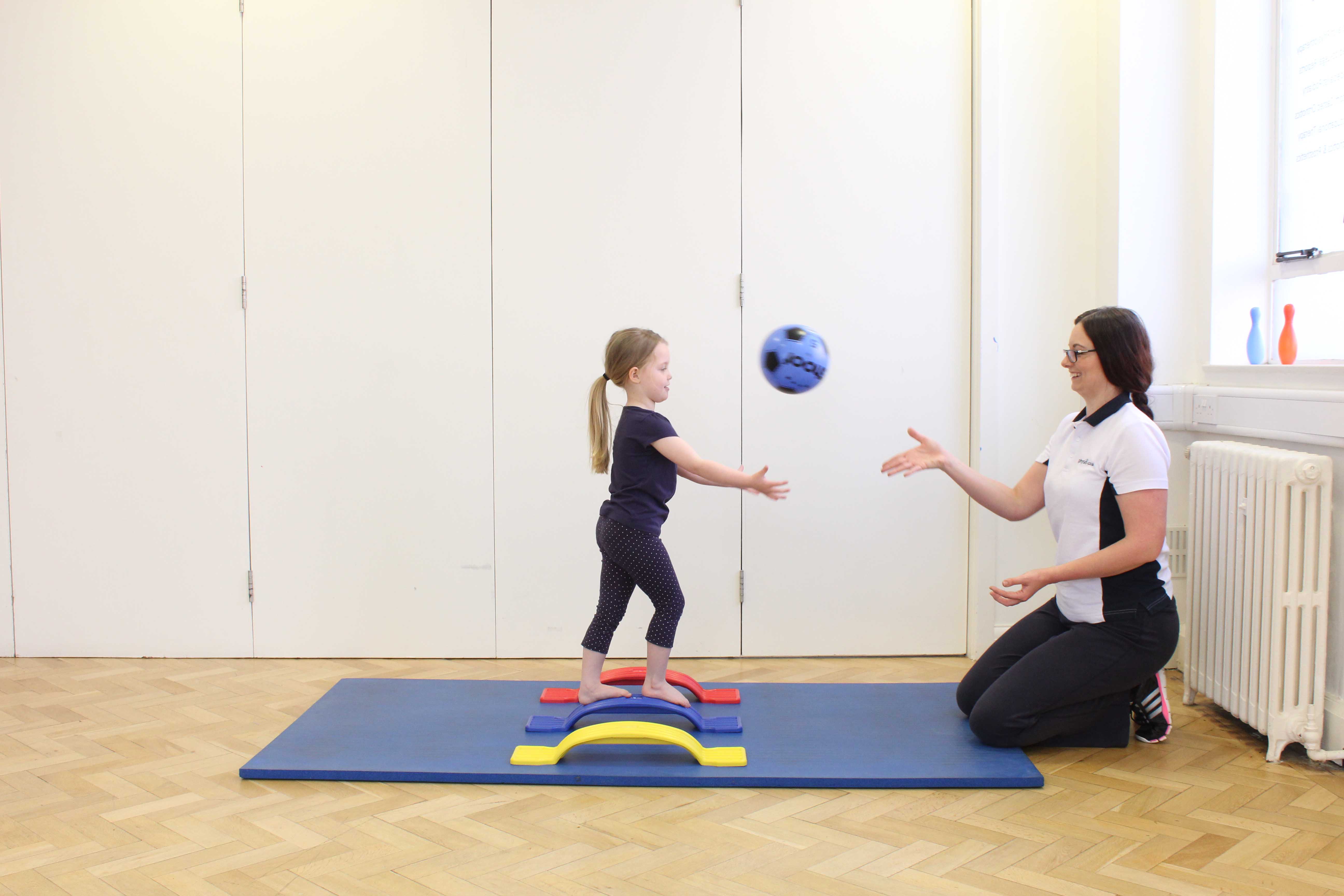Balance and co-ordination rehabilitation exercises assisted by a paediatric physiotherapist