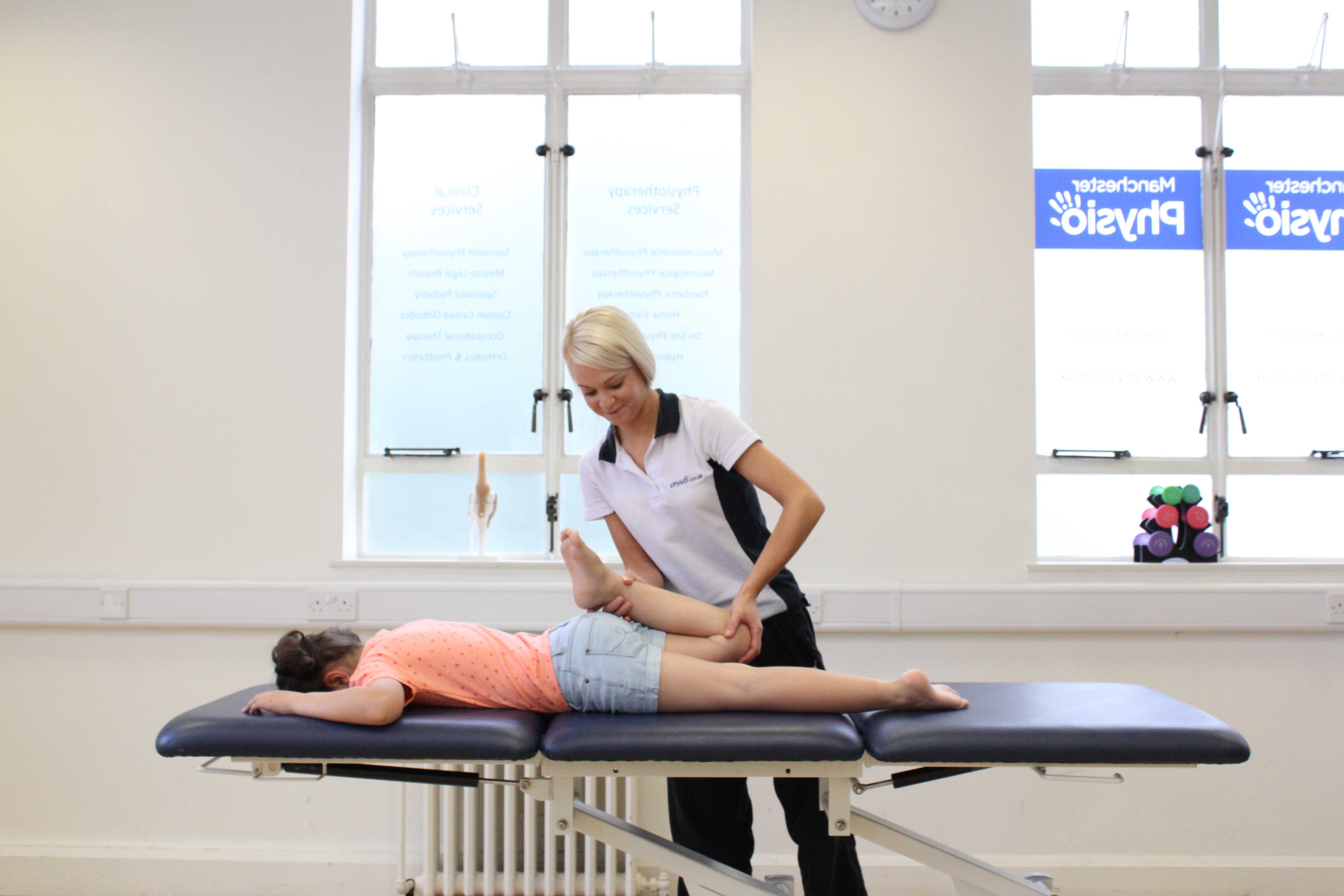 Toning and strengthening exercises assisted by specilaist paediatric physiotherapist