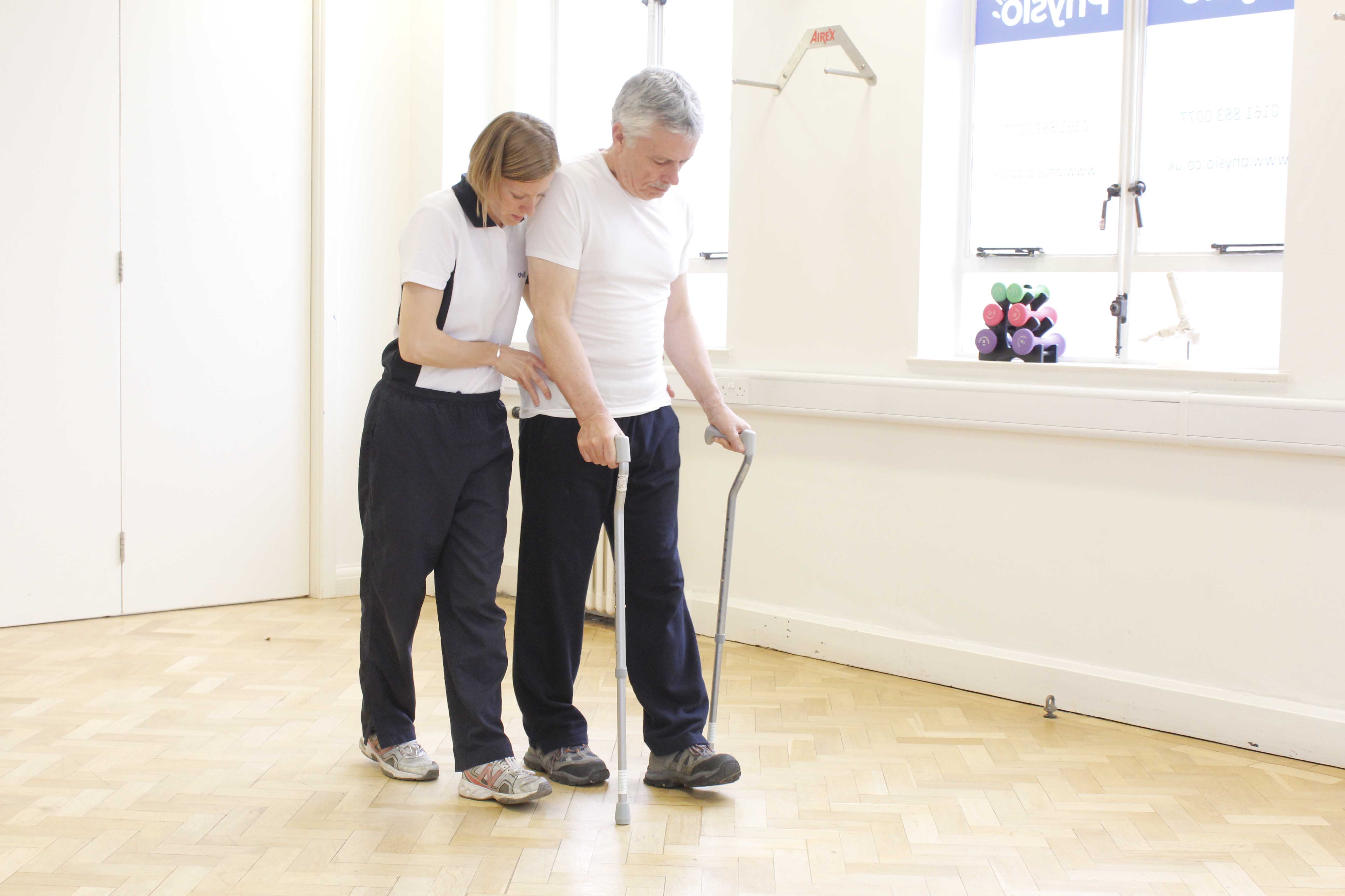 Mobilisation exercises using walking sticks supervised by a neuro physiotherapist