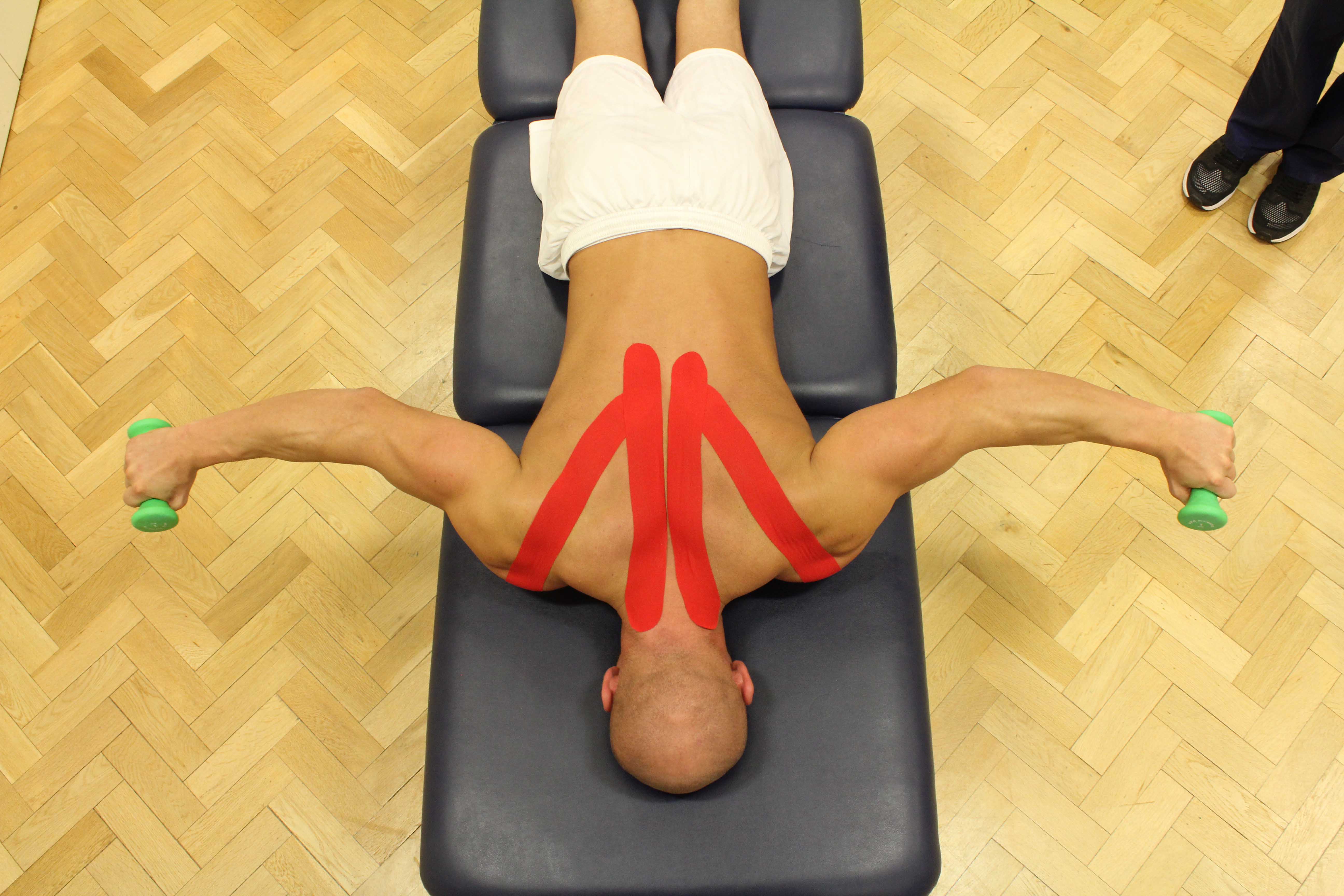 Progressive strengthening exercises isolating the upper back muscles