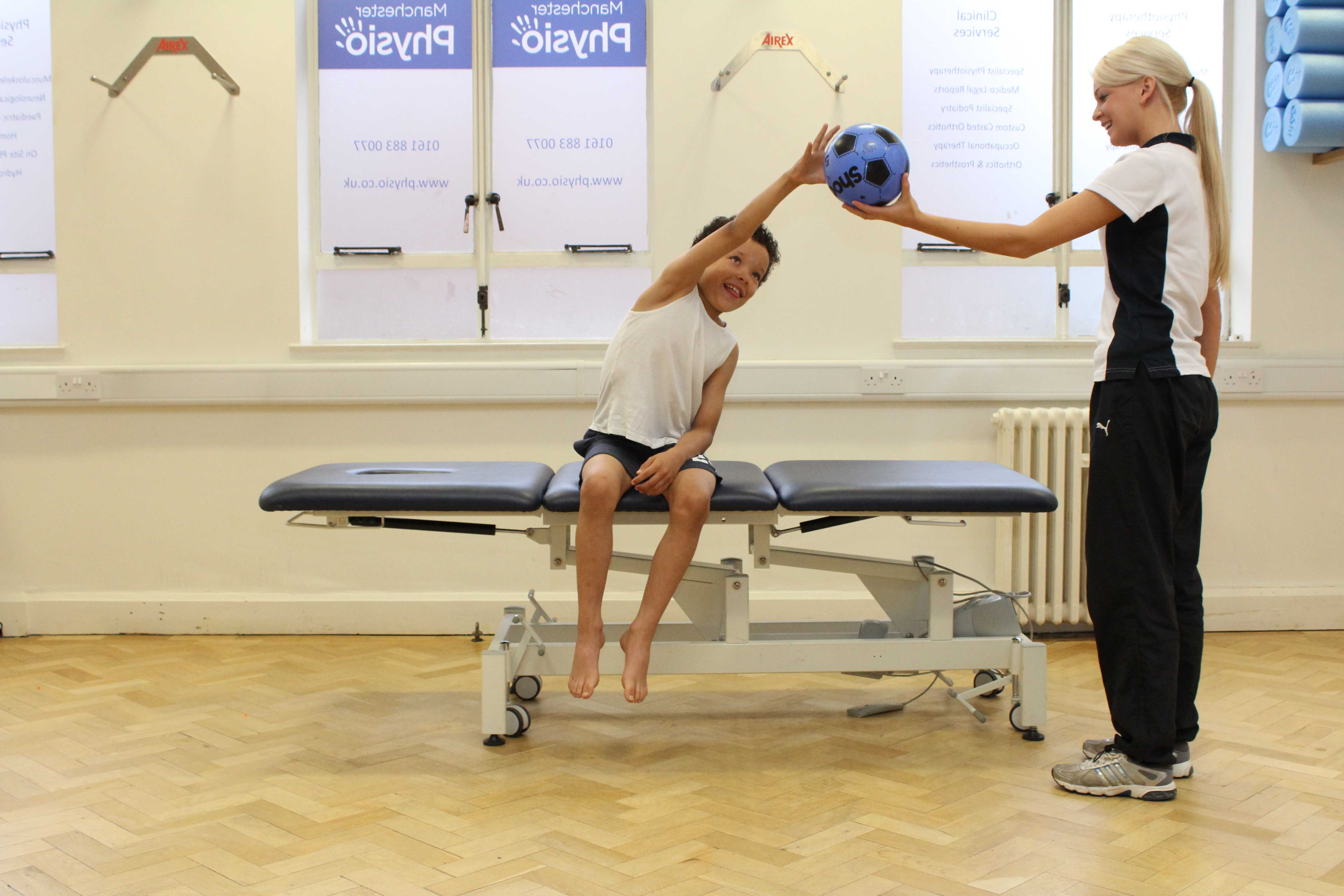 Proprioception and co-ordination exercises assisted by specialist paediatric physiotherapist