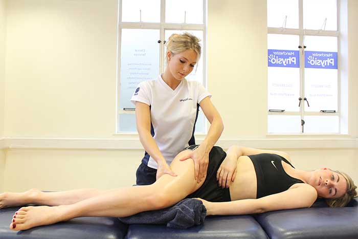 Customer reciving thigh massage to improve blood circulation 