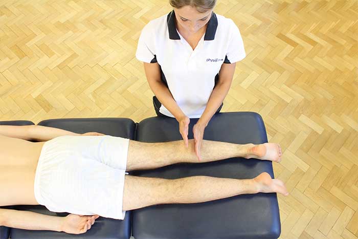 Customer receiving lower leg massage in Manchester Physio Clinic