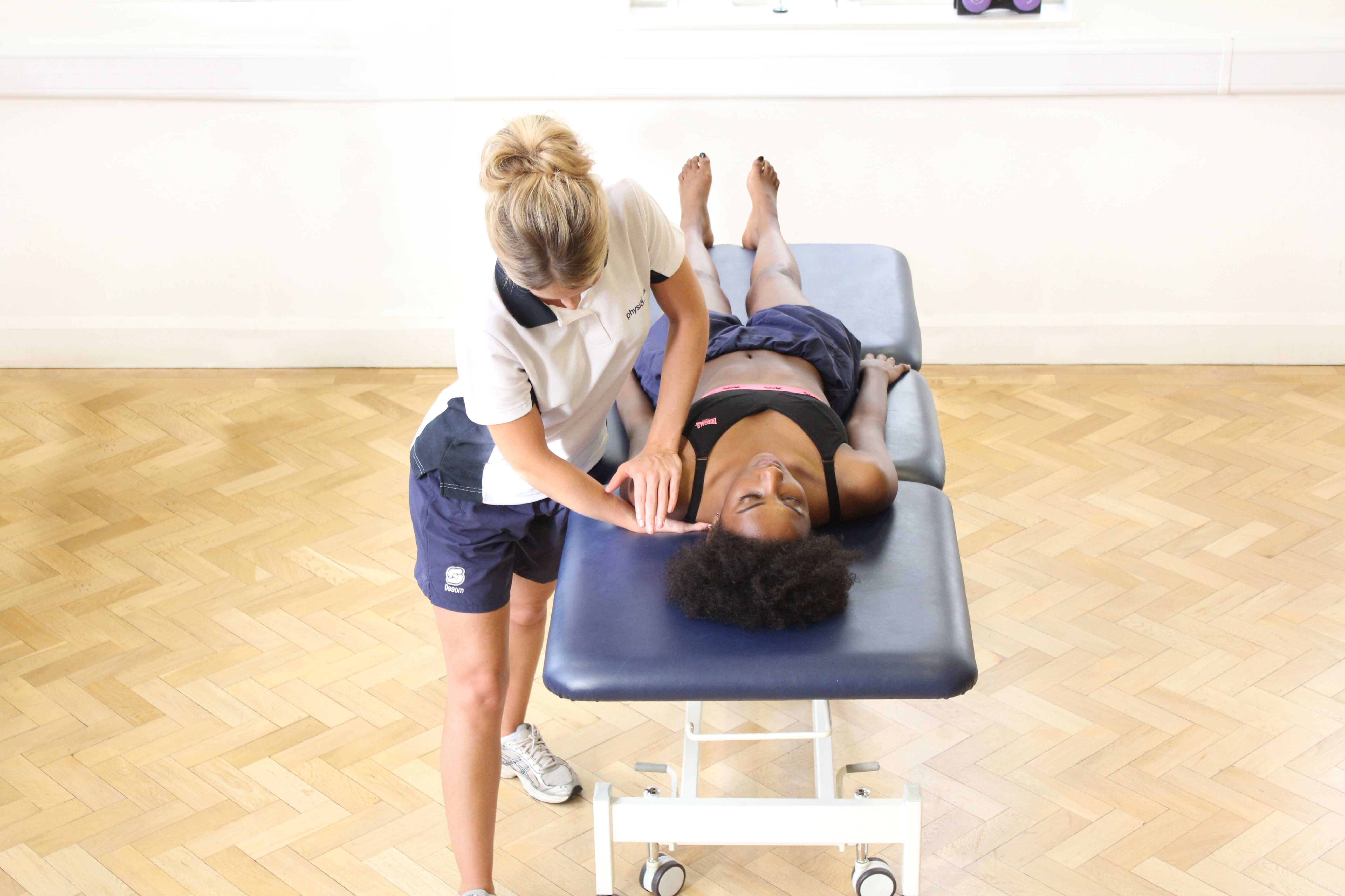 Mobilisations of the lumbar vertebrea by a specilaist physiotherapist