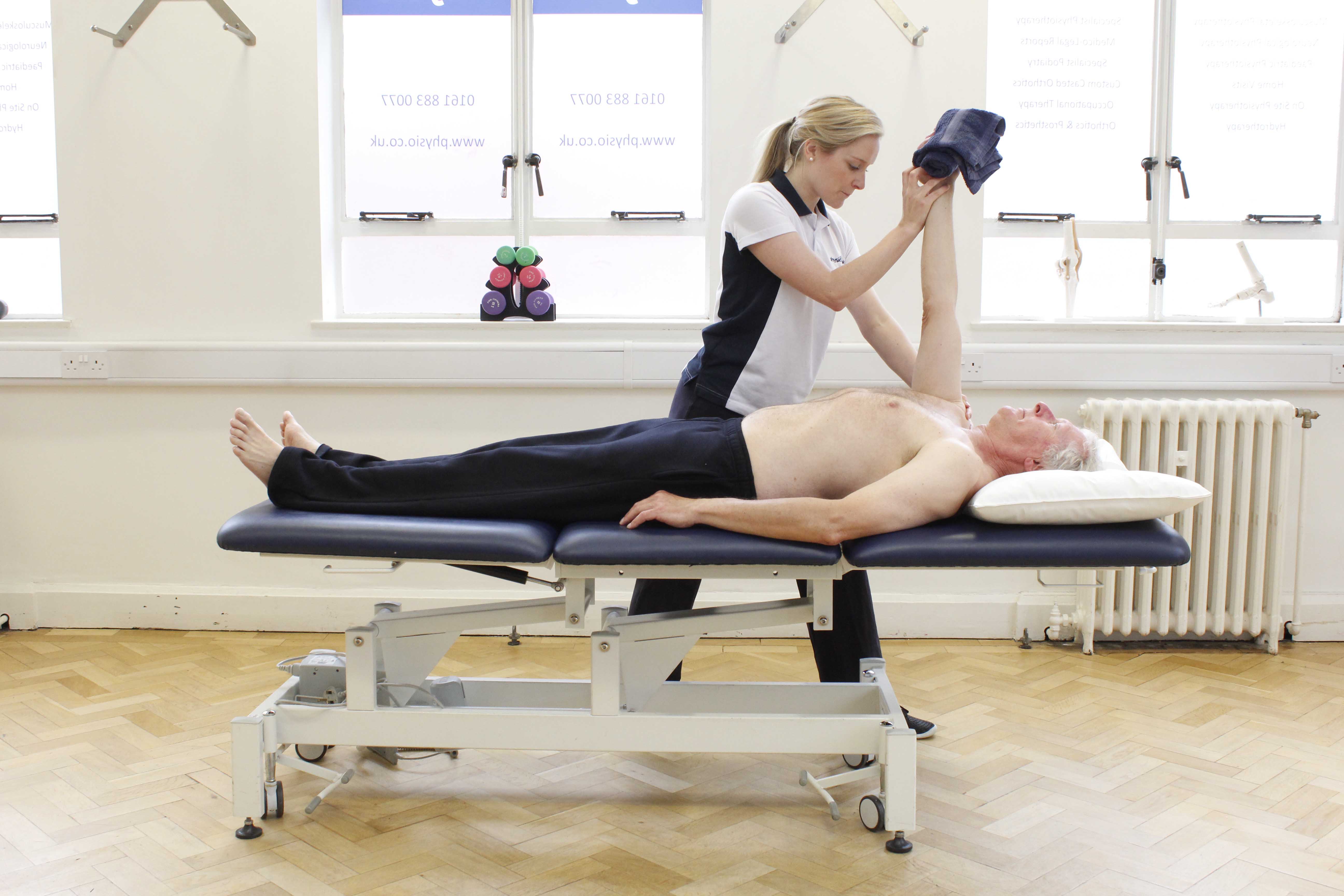 Upper limb mobilisation and stretches performed by a specialist neurological physiotherapist