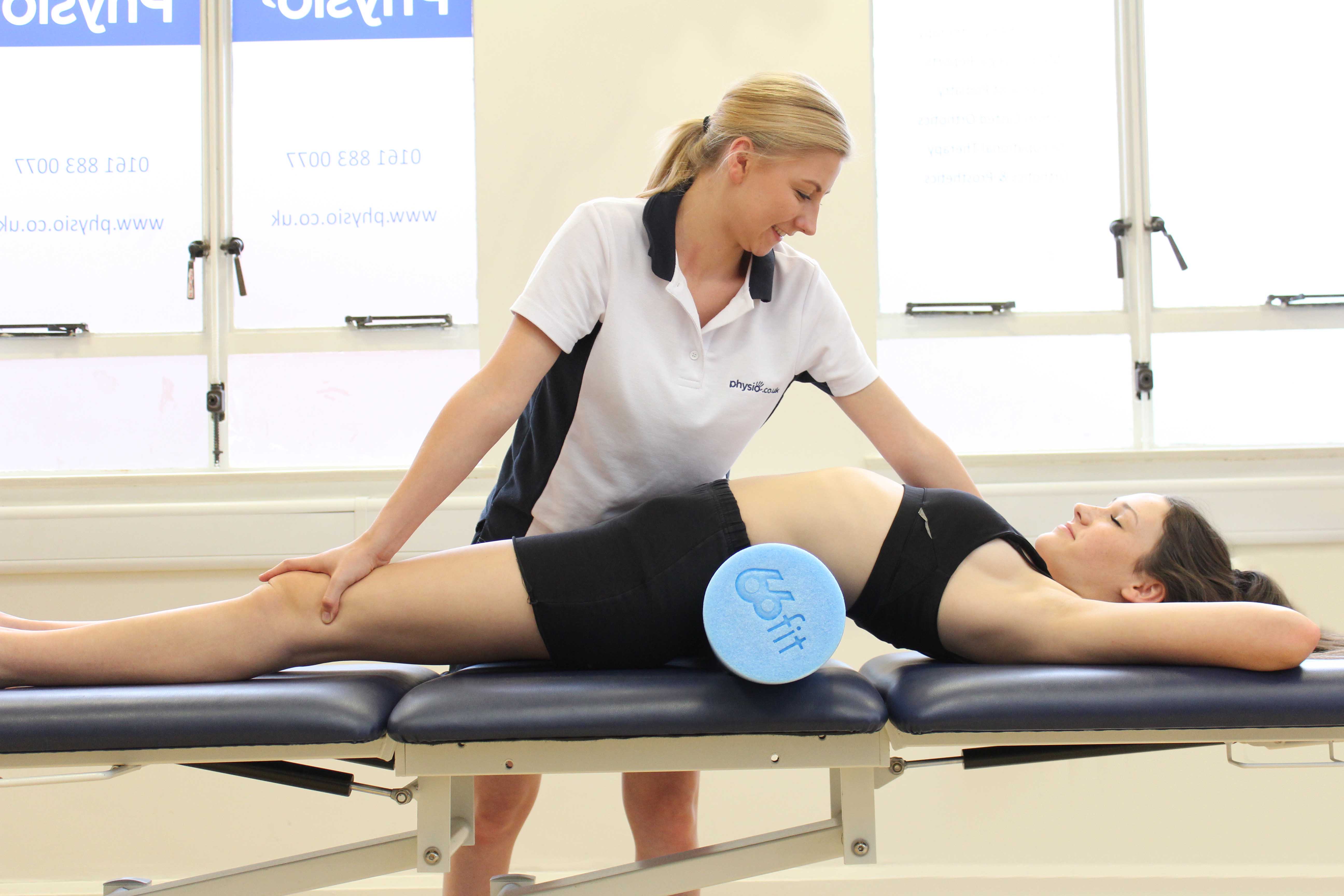 Deep tissue massage of the gluteus muscles by an experienced physiotherapist
