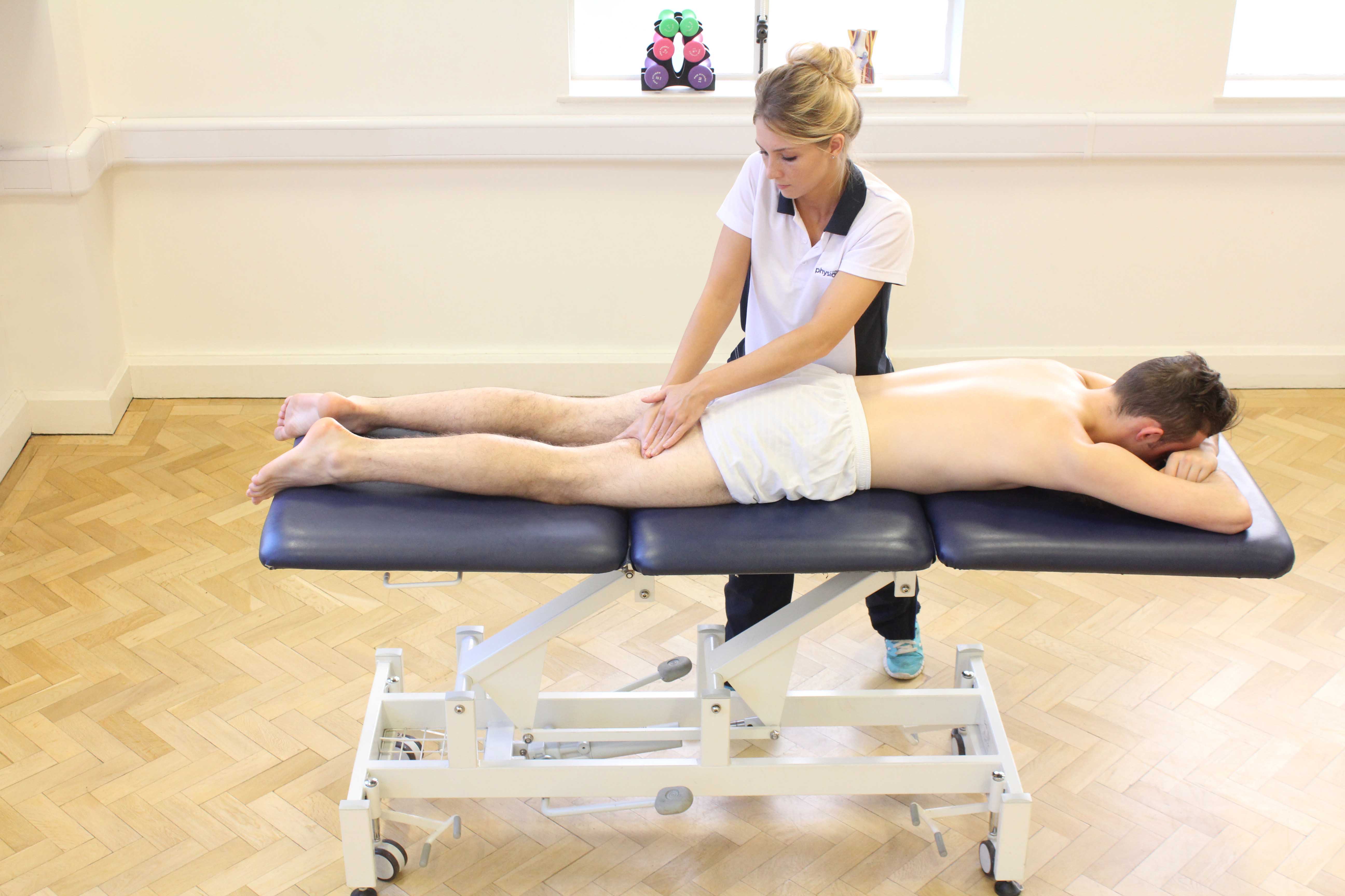 Trigger point massage of the hamstring muscles by an experienced MSK therapist