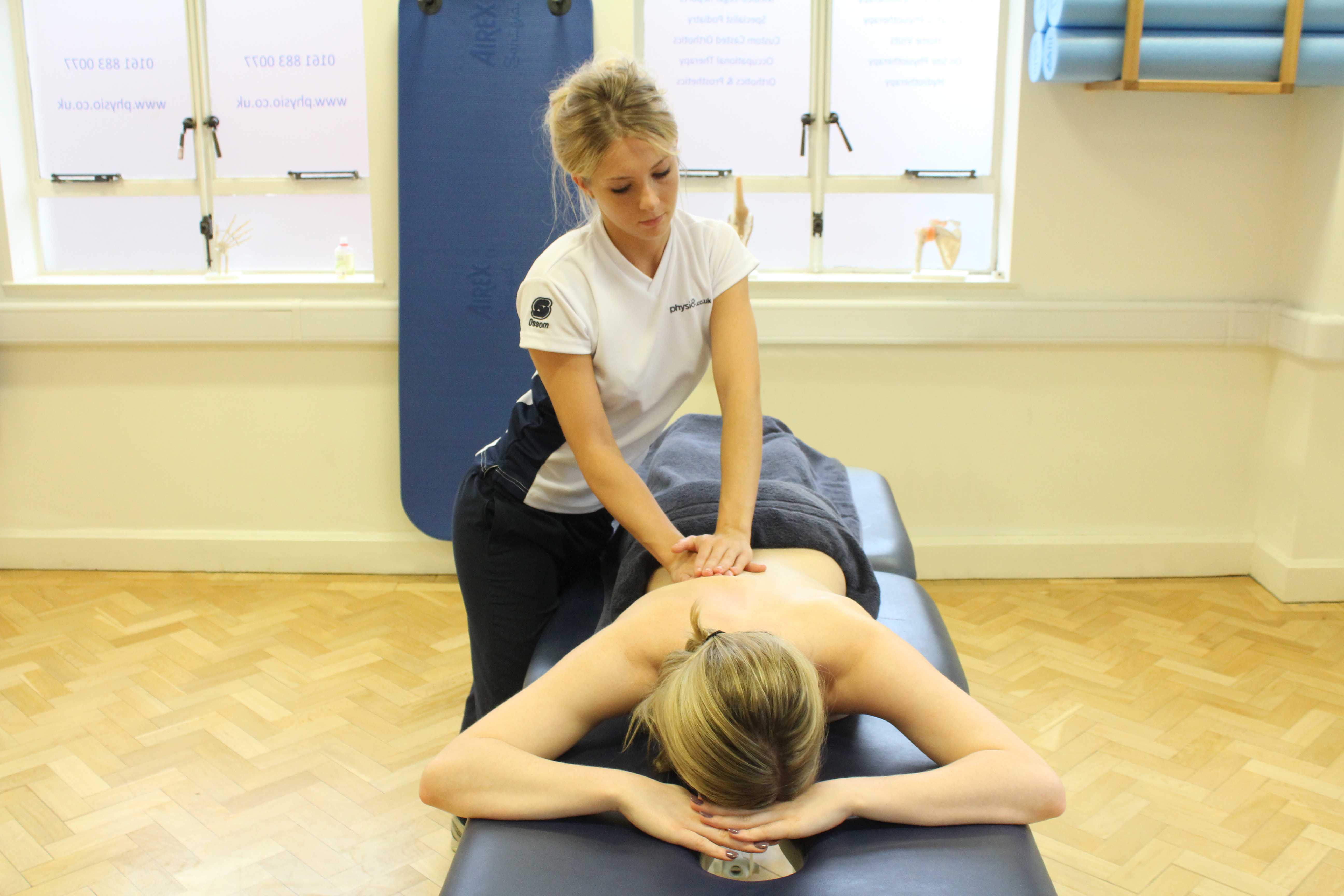 Beating percussion soft tissue massage applied by an experienced therapist