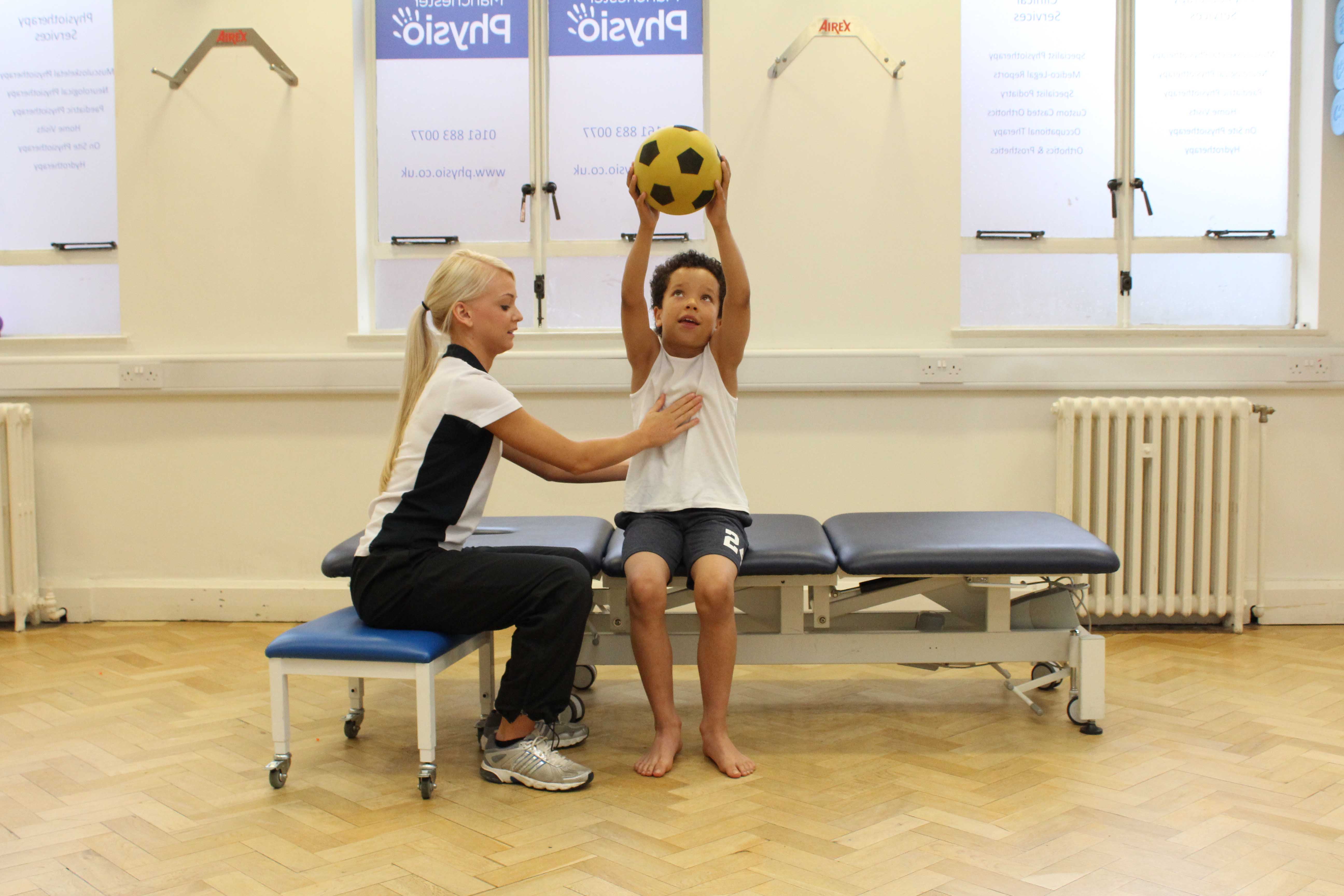 Mobilisation and proprioception exercises supervised by a paediatric physiotherapist