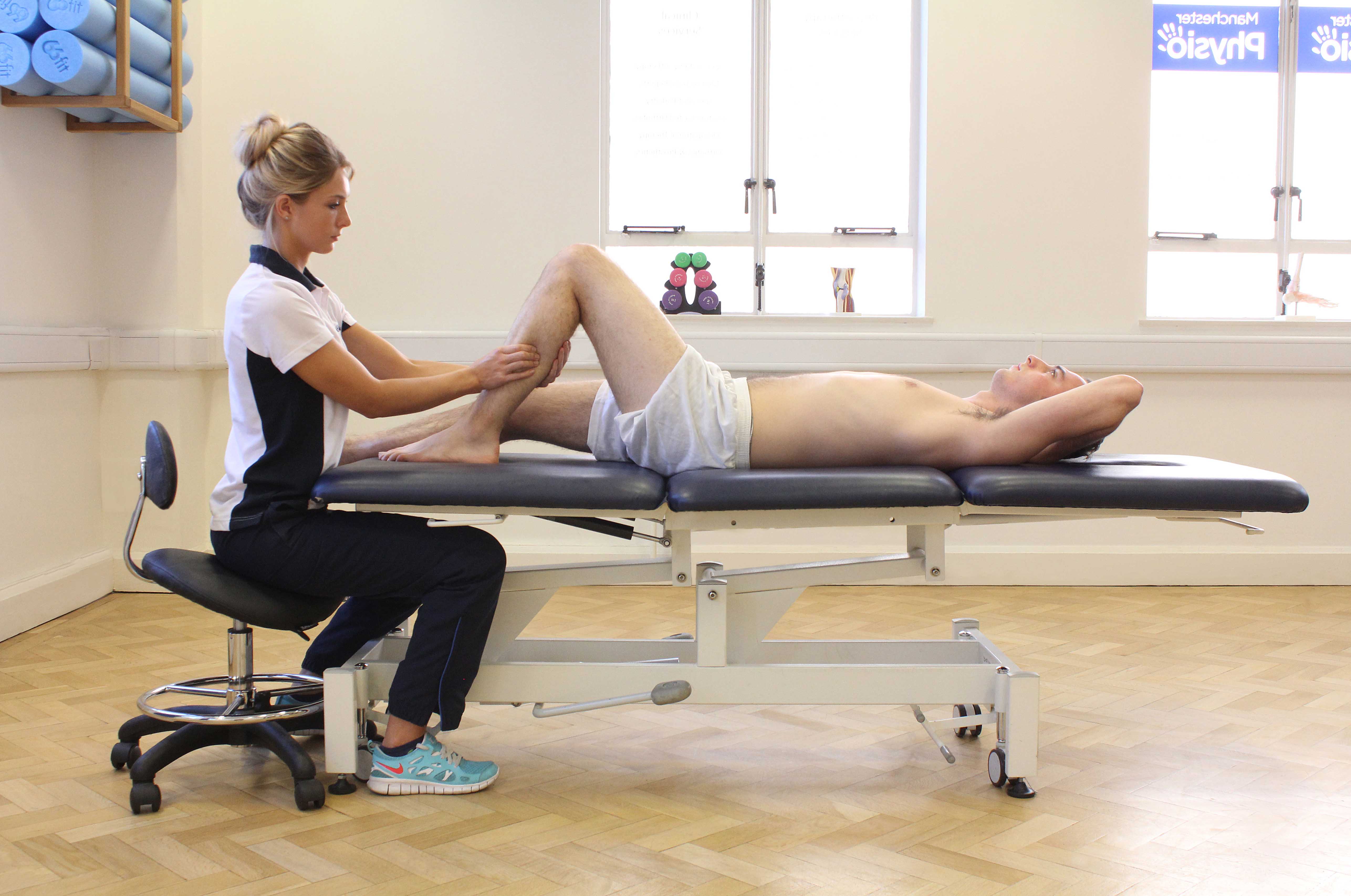 Deep tissue massage apllied to the gastrocnemius muscle by specialist therapist