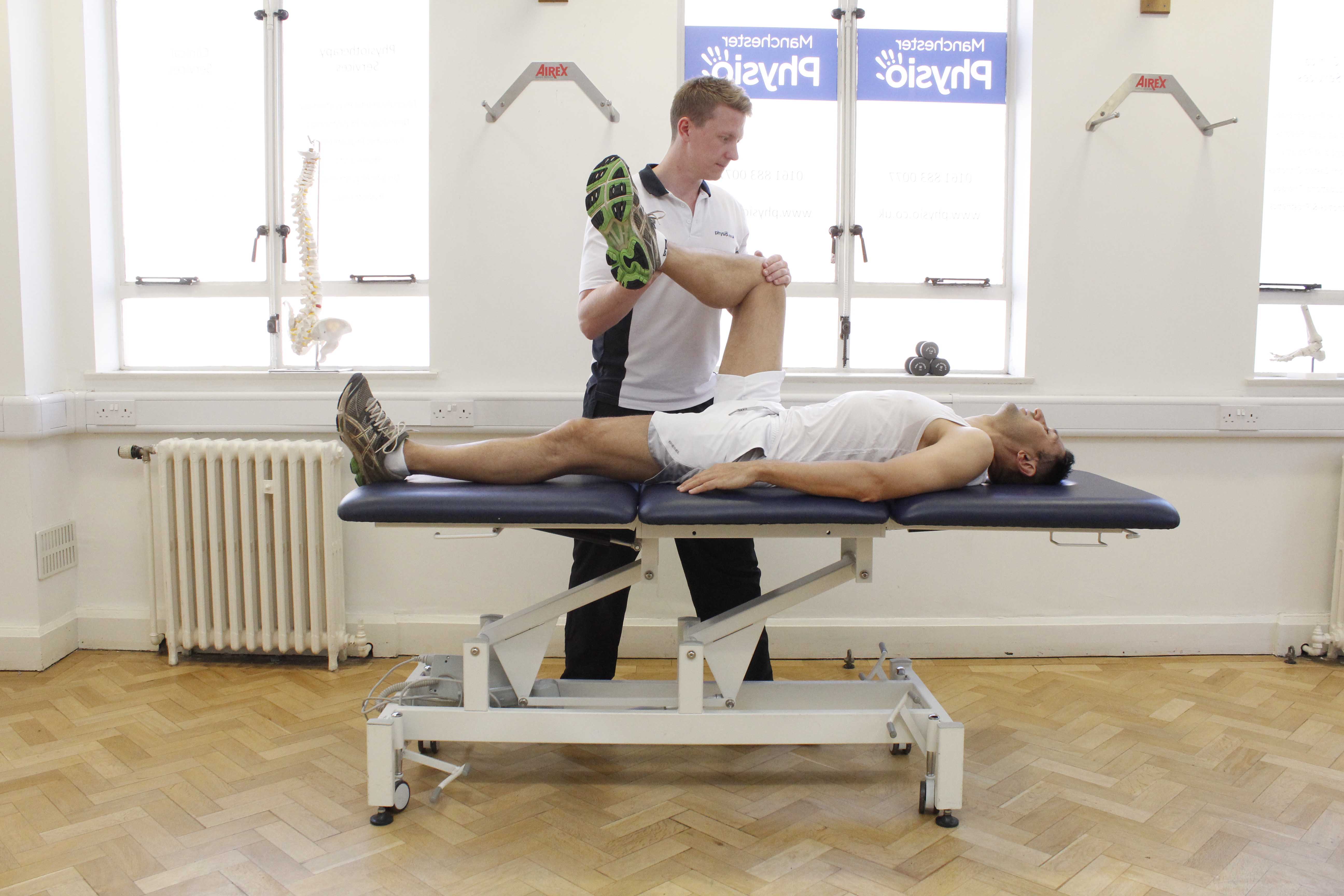Knee stretches and joint mobilisations performed by an experienced physiotherapist