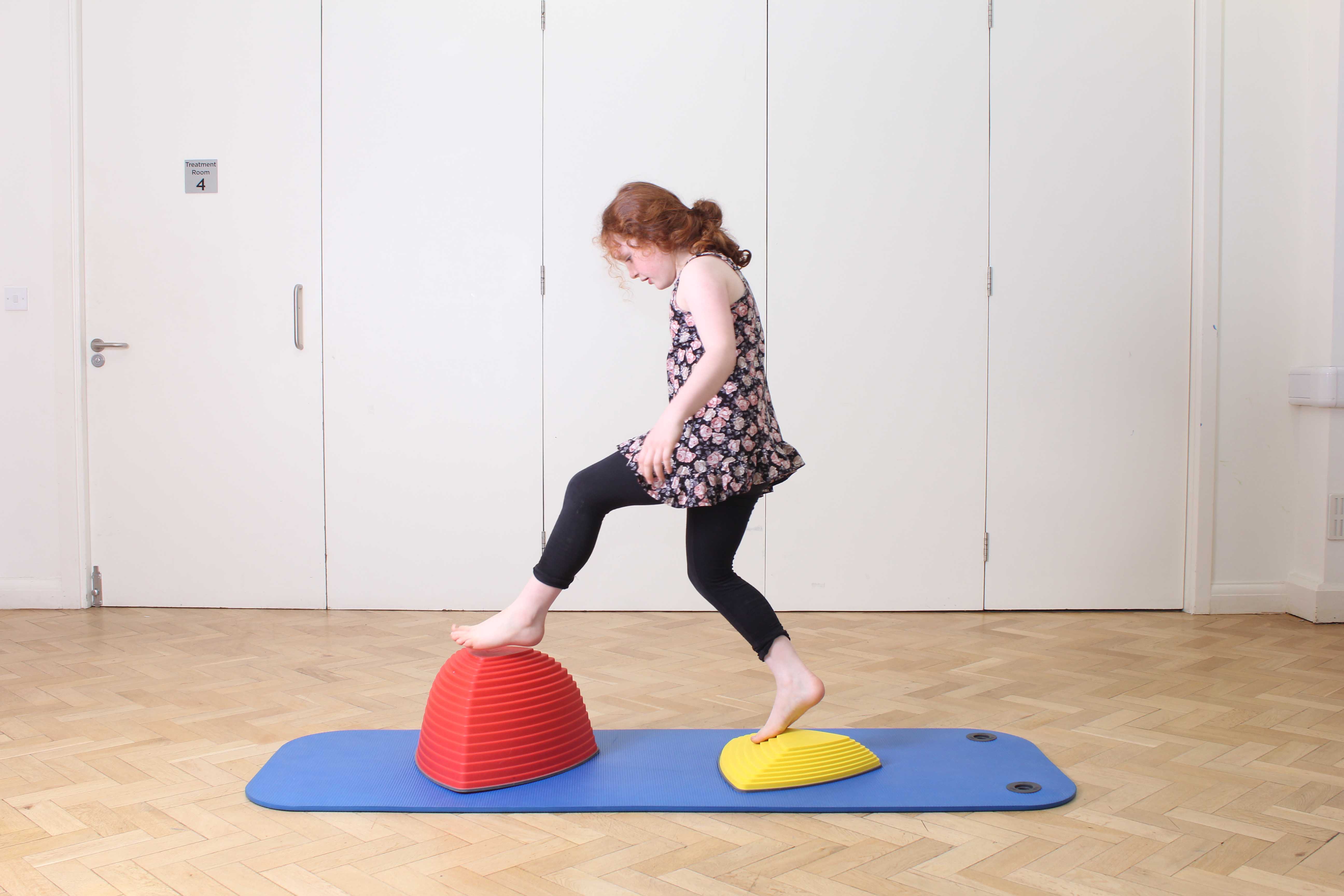 Functional mobility exercises assisted by an experienced paediatric physiotherapist