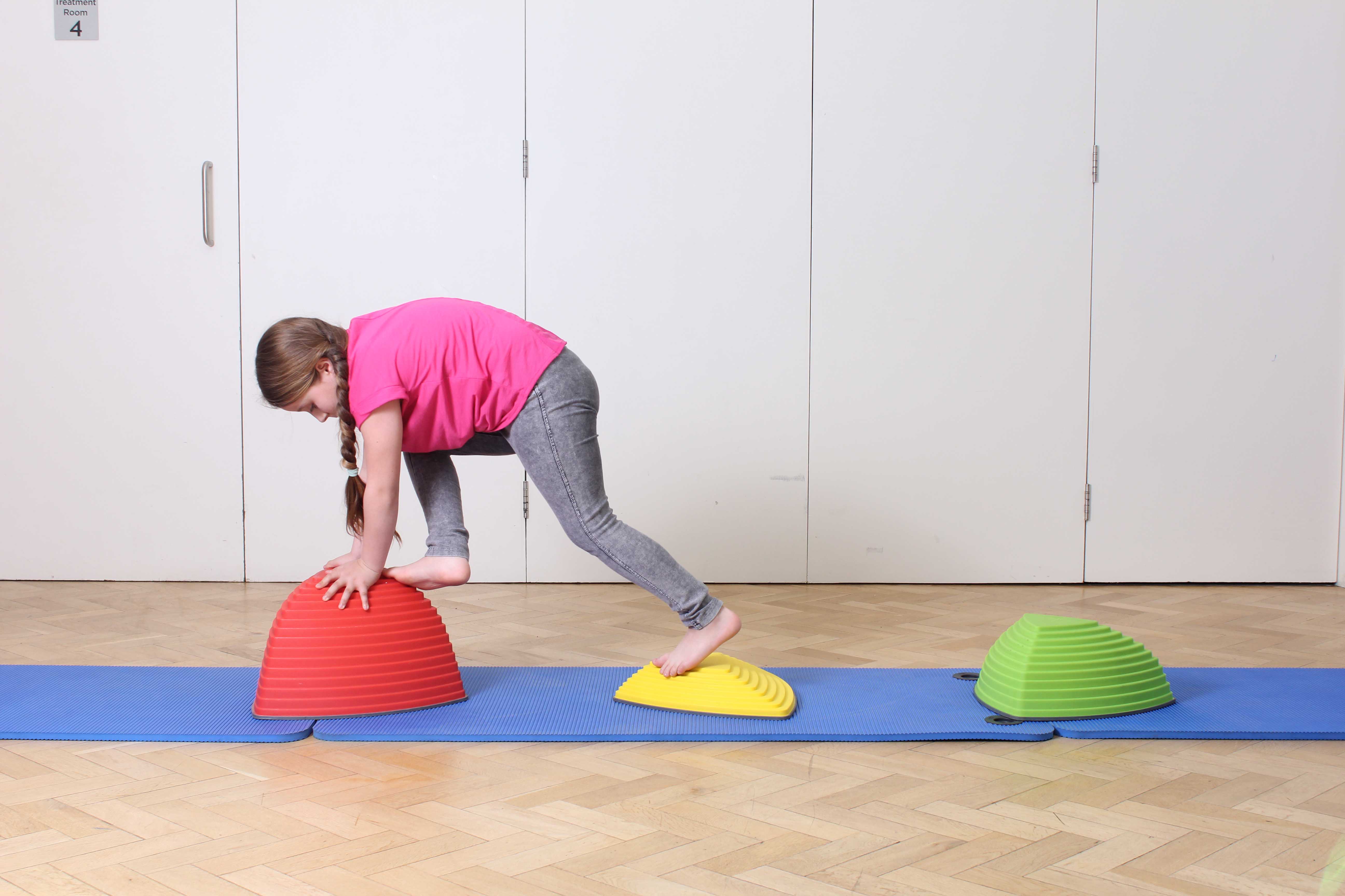 Toning and strengthening exercises assisted by specilaist paediatric physiotherapist
