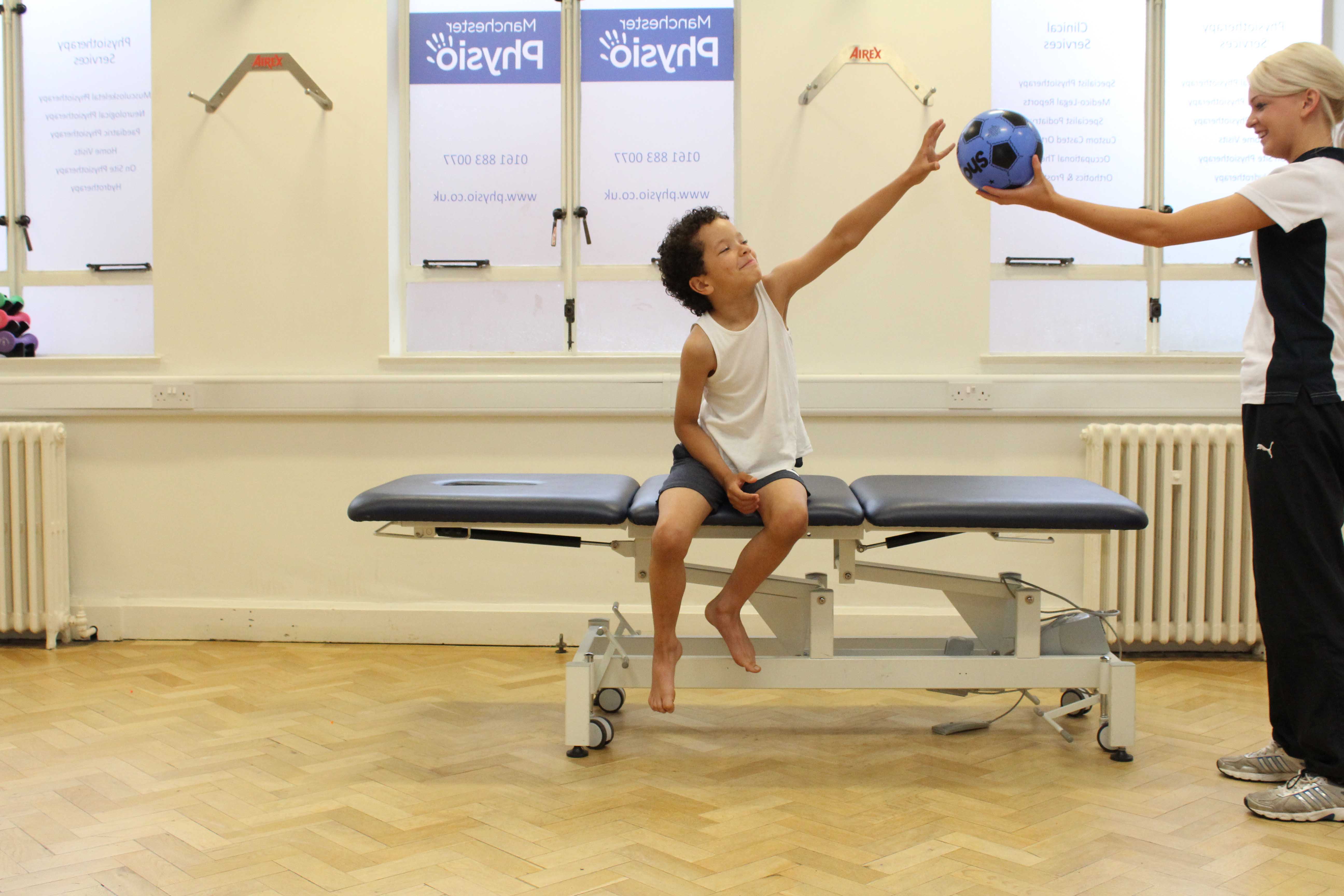 Gross motor skill exercises conducted by a paediatric neurological physiotherapist