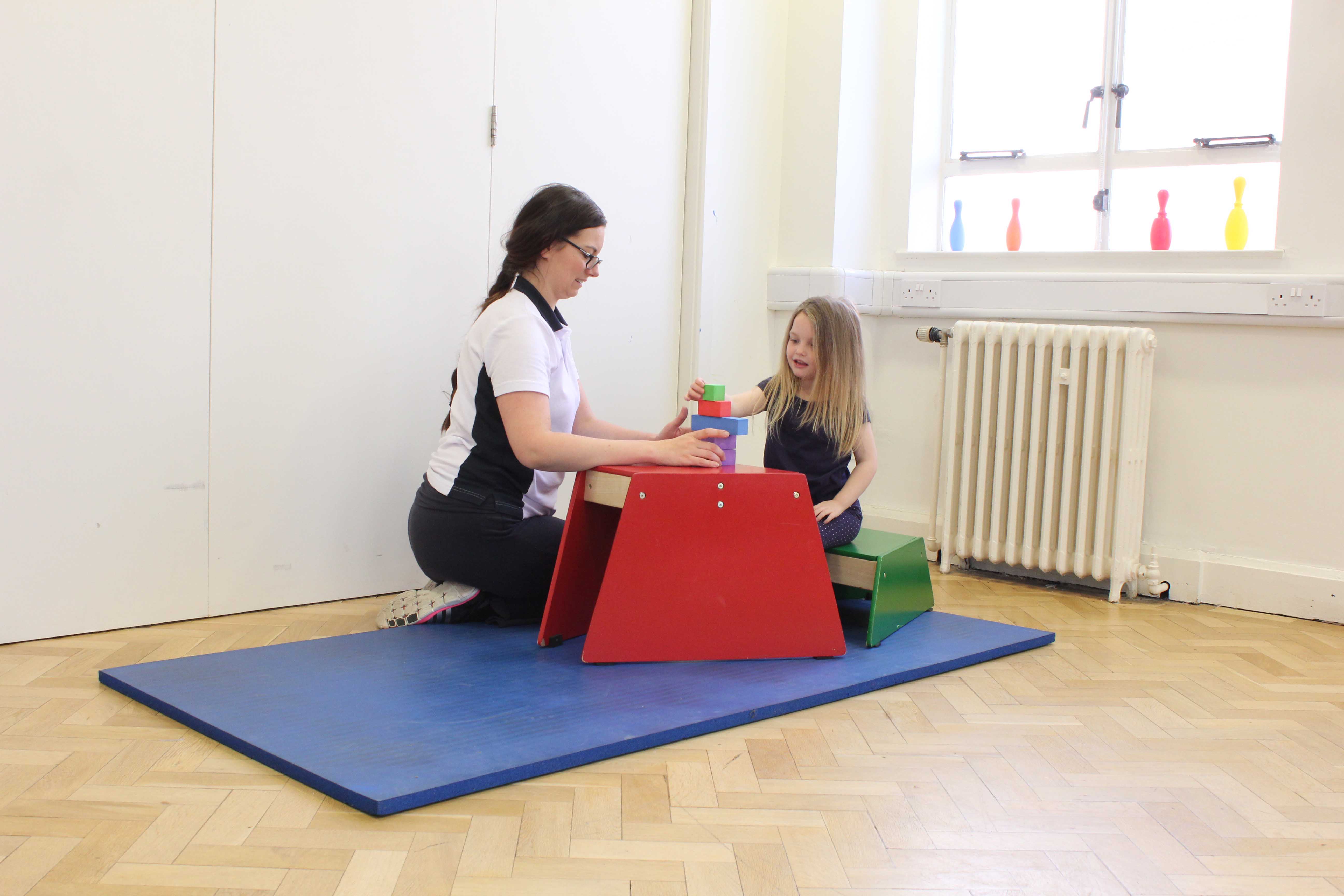 Fine motor skill rehabilitation for the upper limb assisted by a specialist paediatric physiotherapist
