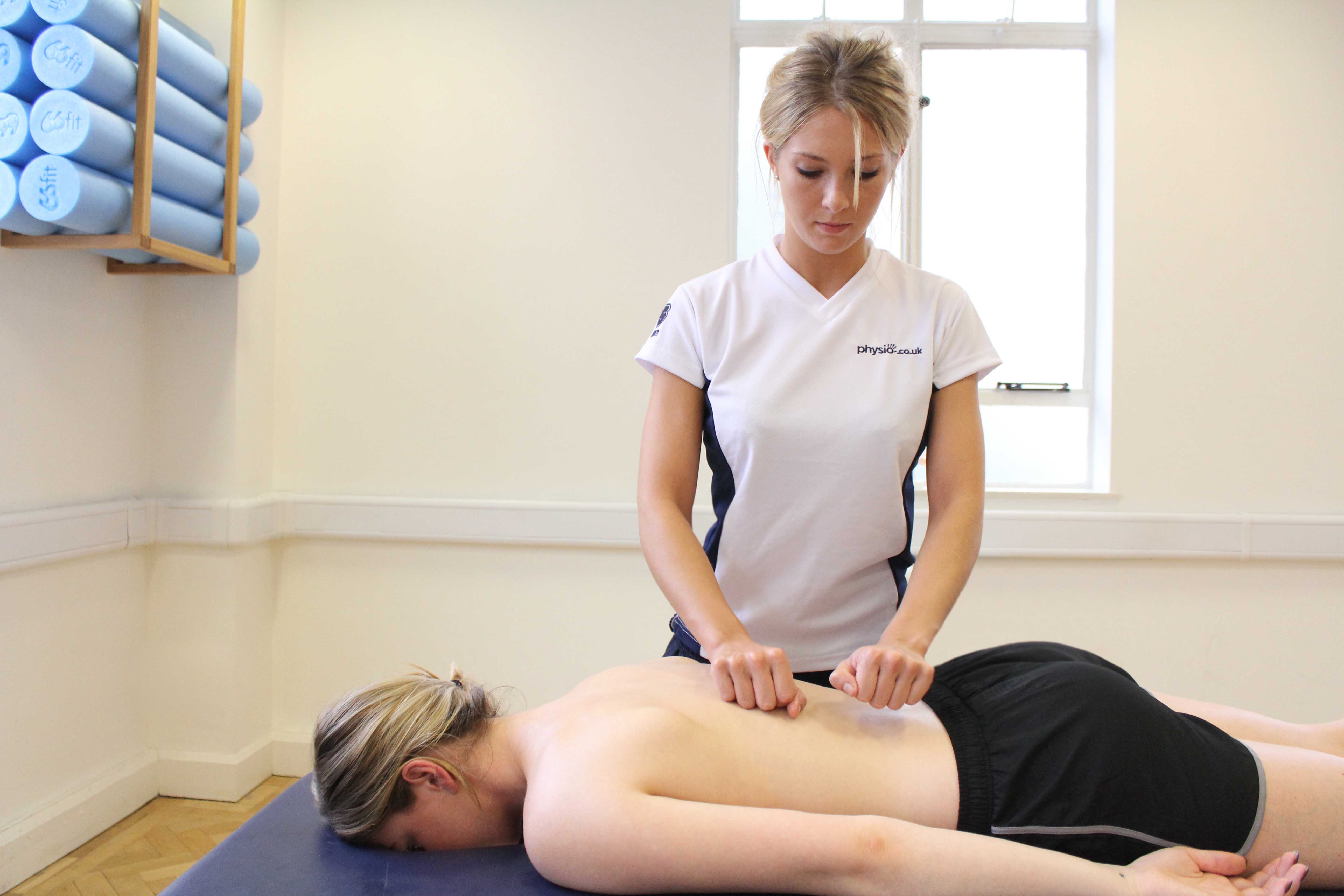 Beating percussion soft tissue massage applied by an experienced therapist