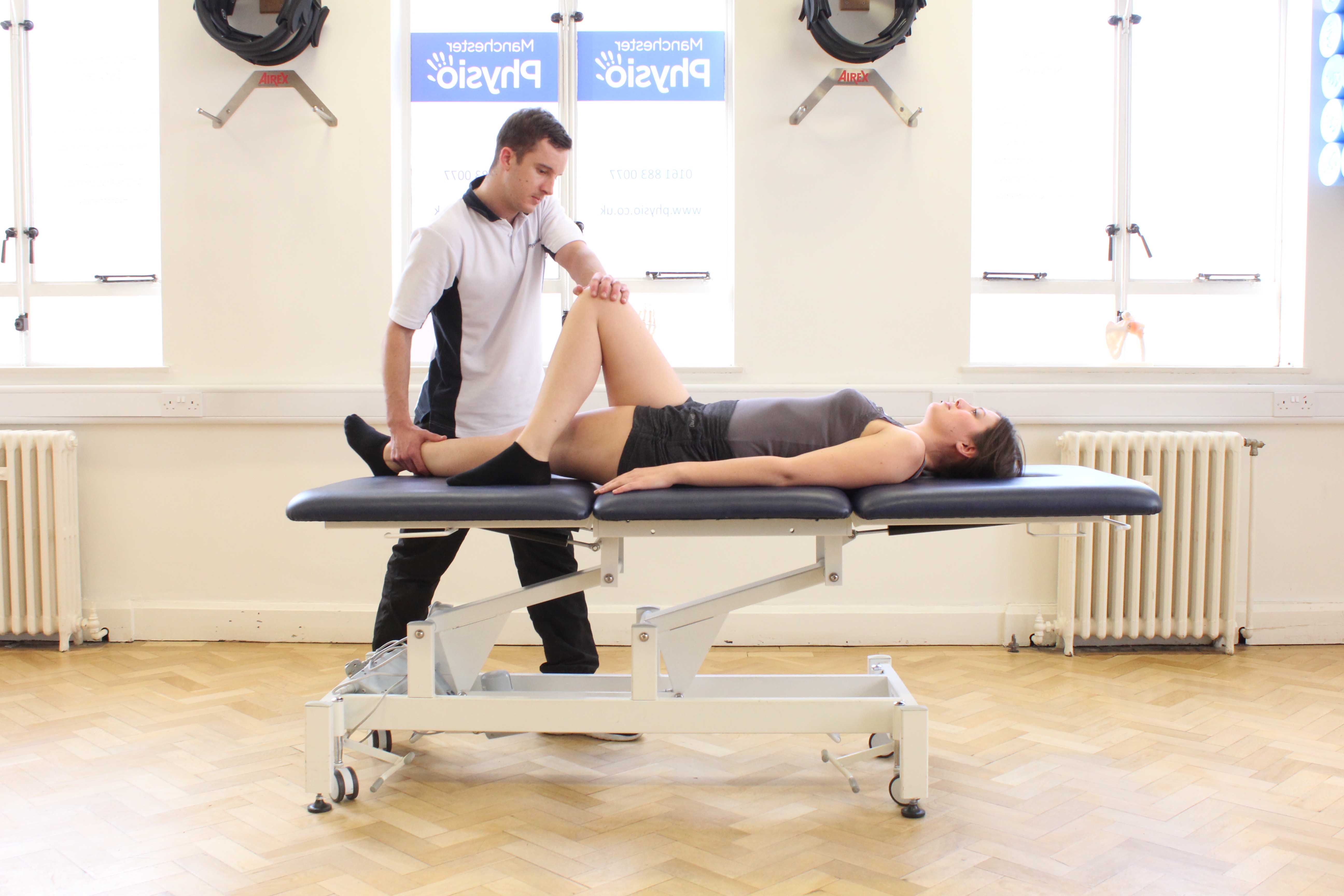 Passive stretches of the groin and pelvic muscles with supervision from a MSK therapist
