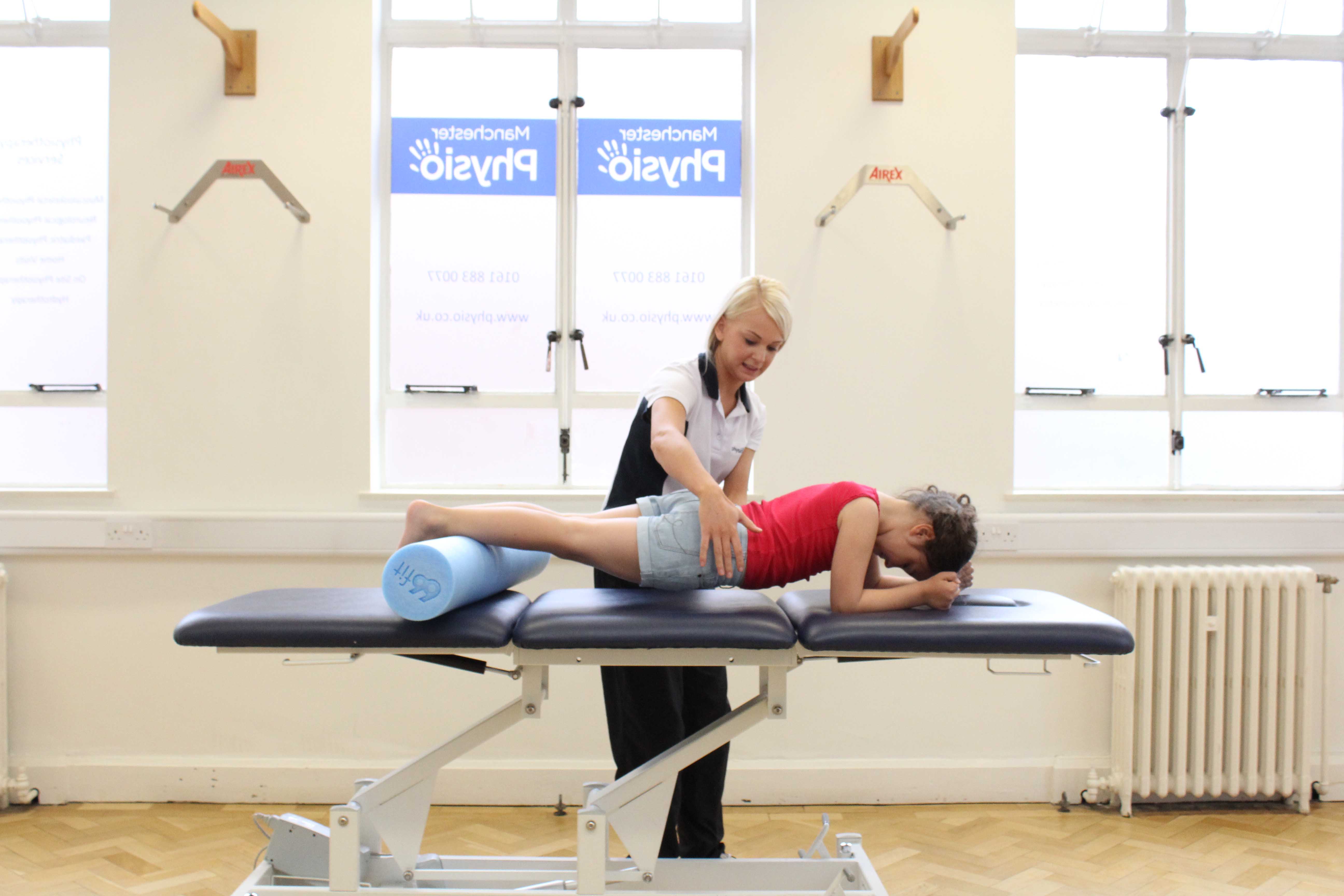 Planking exercise to raise tone in patient core muscles