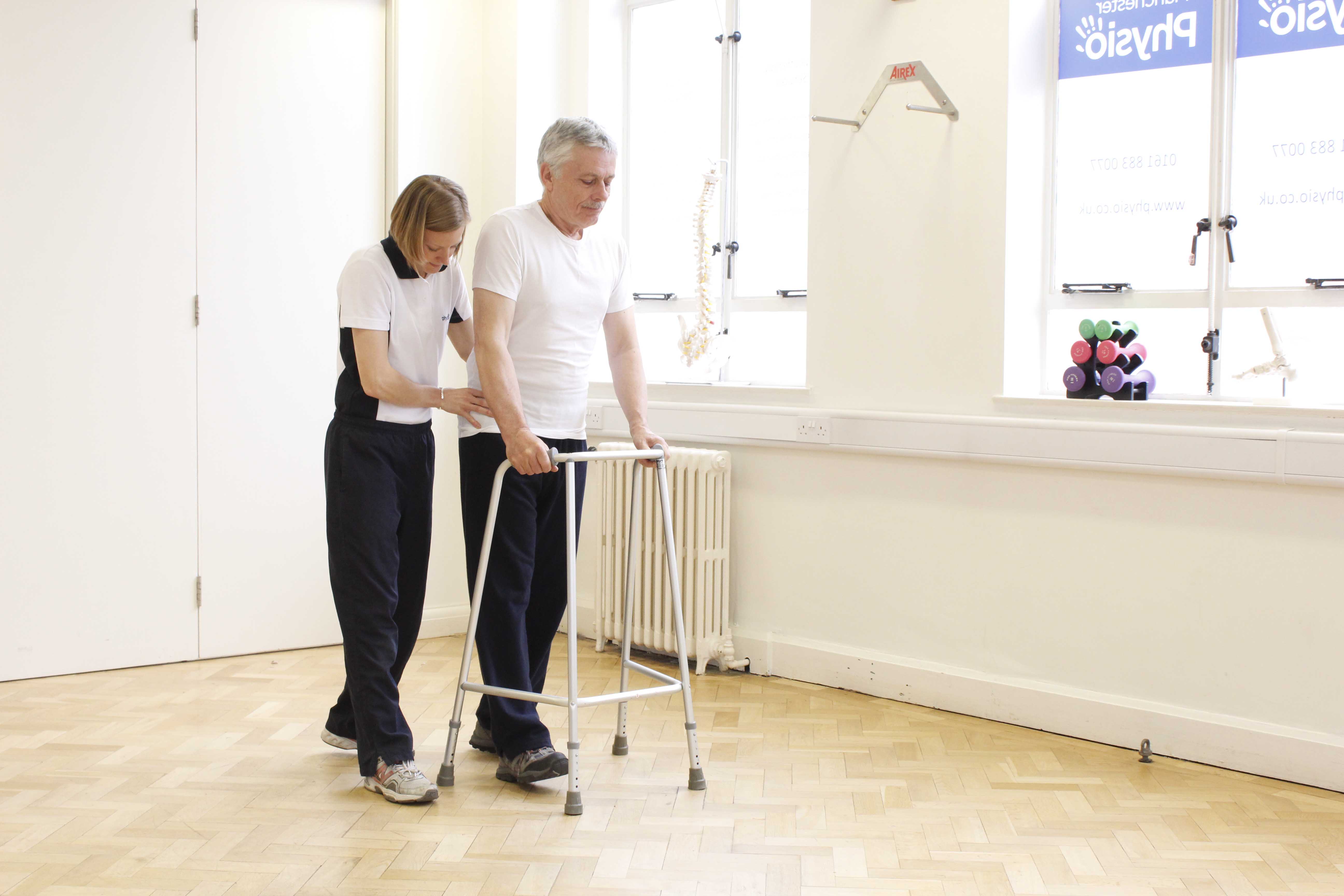 Mobility exercises using a walking frame under the close supervision of an experienced physiotherapist