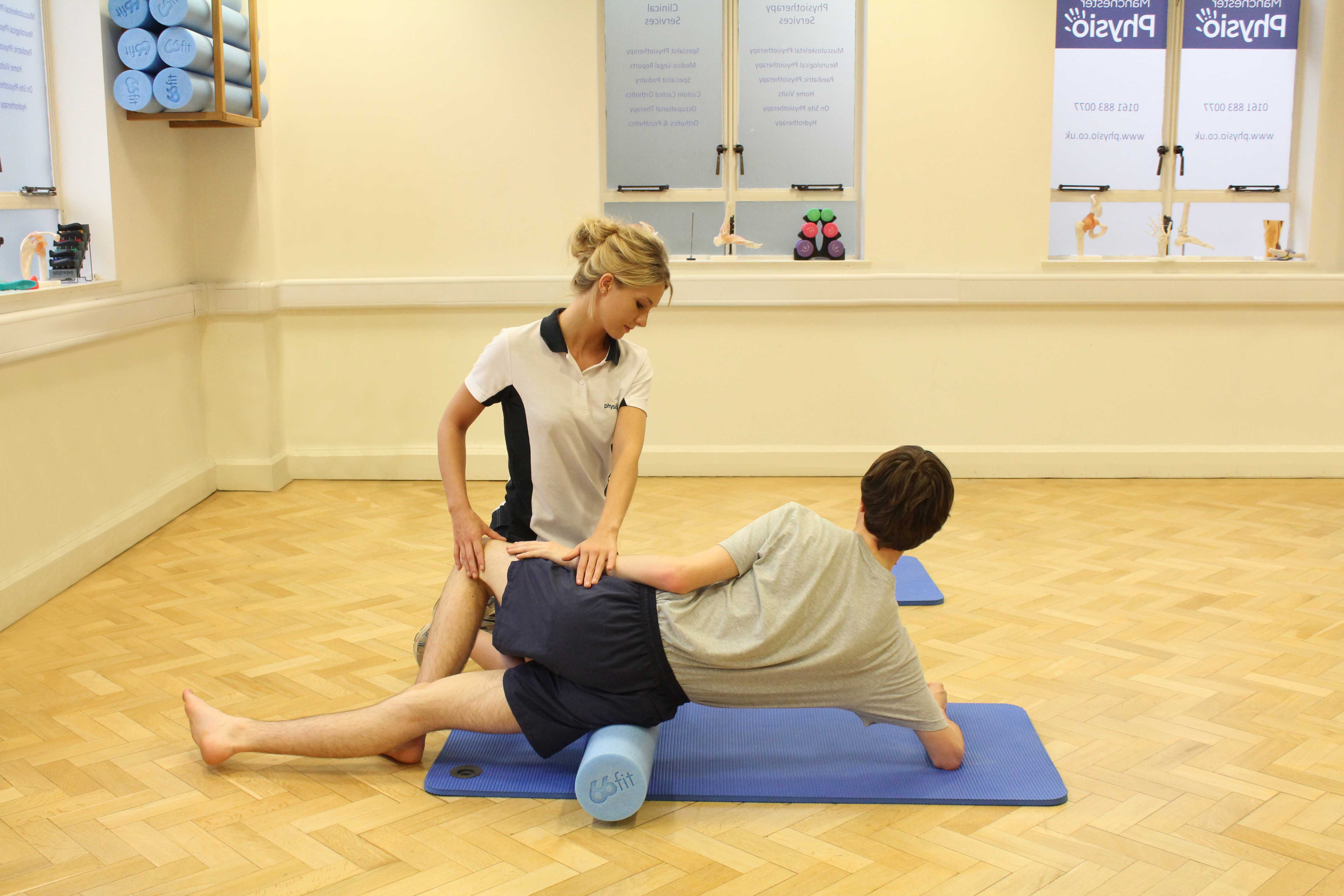 Active stretch and mobilisations of the hip and pelvis under supervision from a therapist