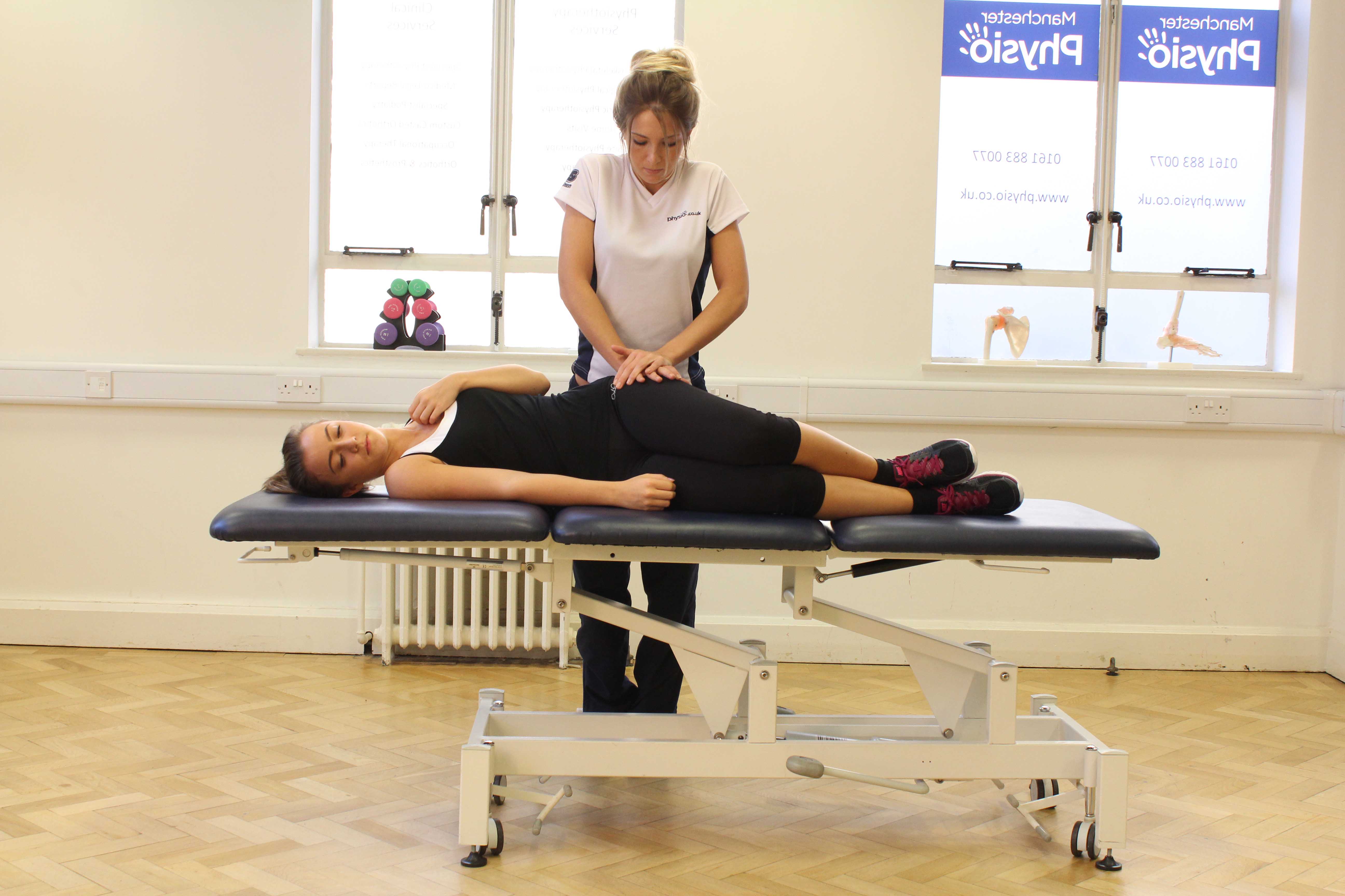 Mobilisations of the hip and pelvis by a specialist massage therapist