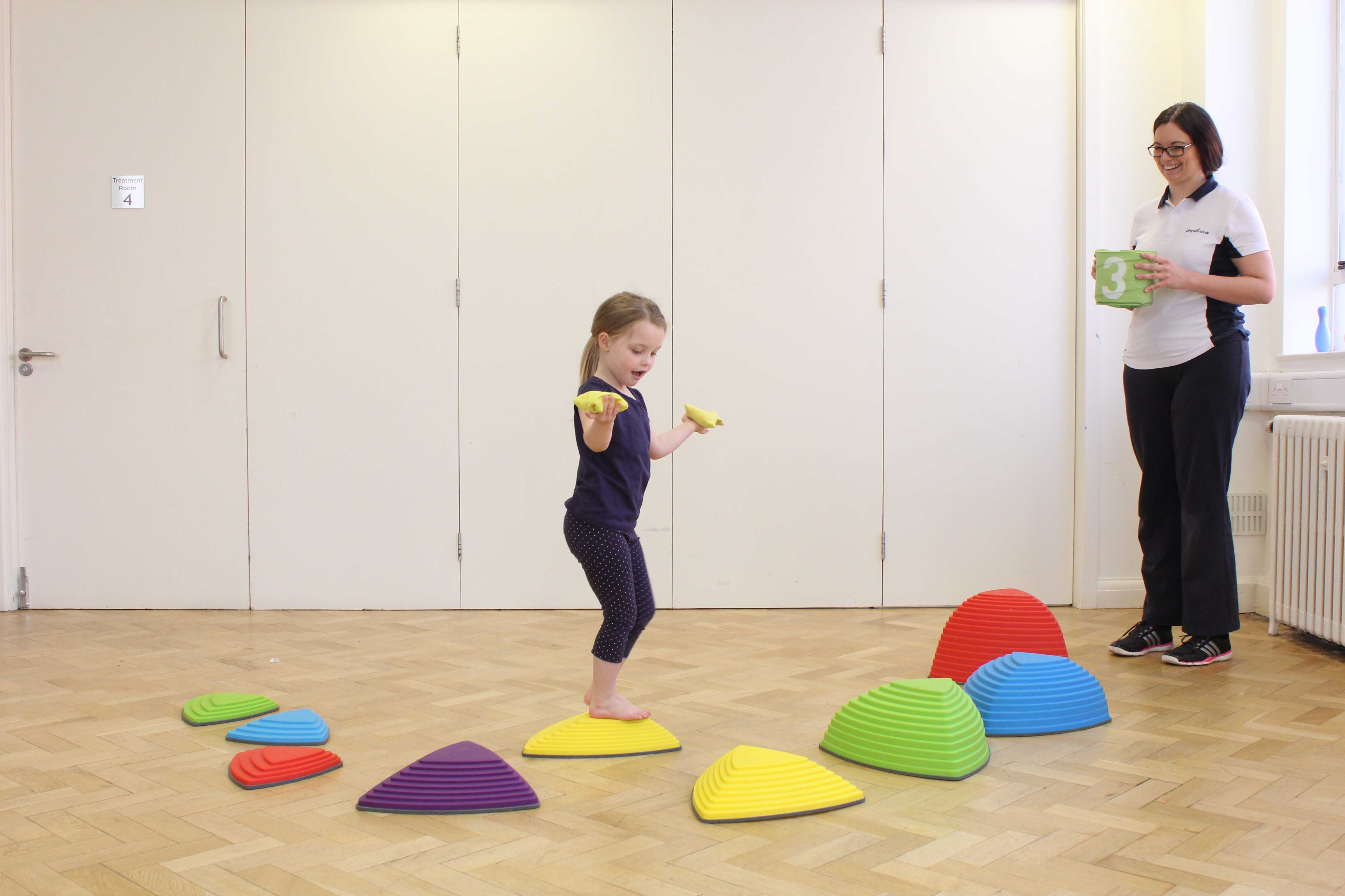 Overcomig sensory defensiveness through play activities supervised by a paediatric physiotherapist