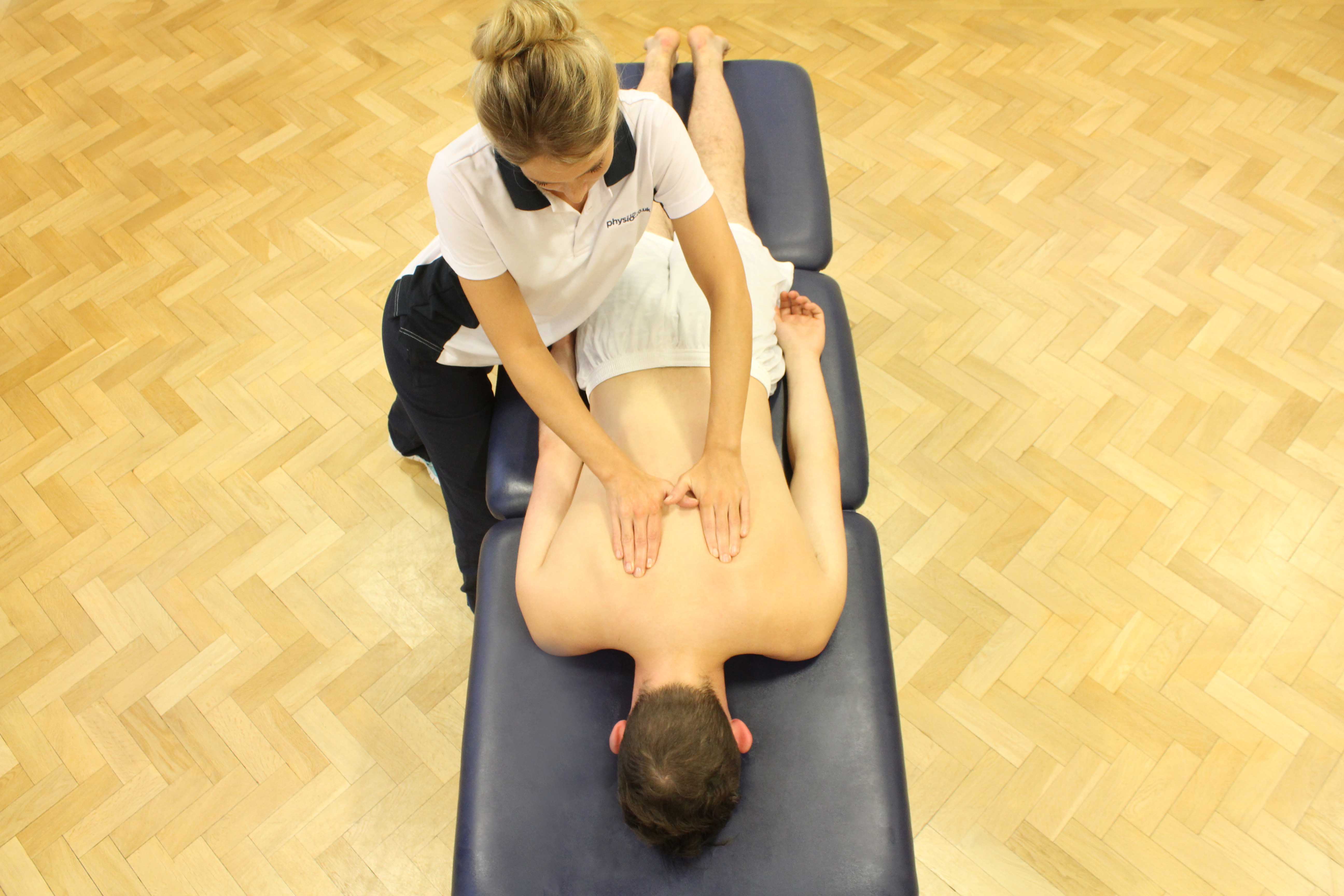 Soft tissue massage of the upper thoracic spine